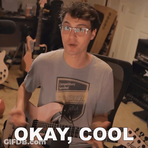 A Man Playing A Guitar With The Words Okay Cool Written Below Him GIF