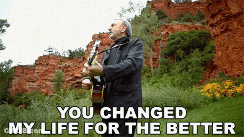 A Man Playing A Guitar With The Words You Changed My Life For The Better GIF
