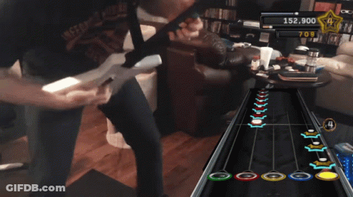 A Man Playing A Video Game With 153,700 Points On The Screen GIF
