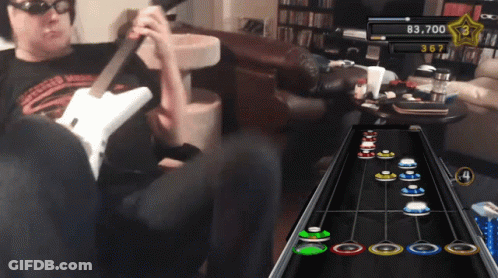A Man Playing A Video Game With A Score Of 83,700 Points GIF