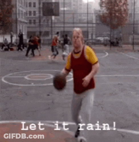 A Man Playing Basketball On A Court With The Words Let It Rain Written Below Him GIF