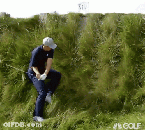 A Man Playing Golf In A Field With A Nbc Golf Logo On The Bottom GIF
