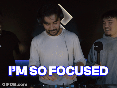 A Man Playing Music With The Words I 'M So Focused GIF