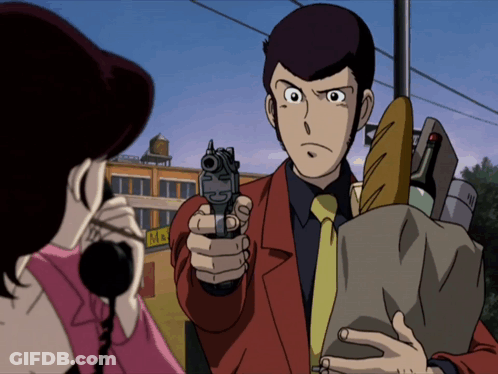 A Man Pointing A Gun At A Woman Holding A Bag Of Bread GIF