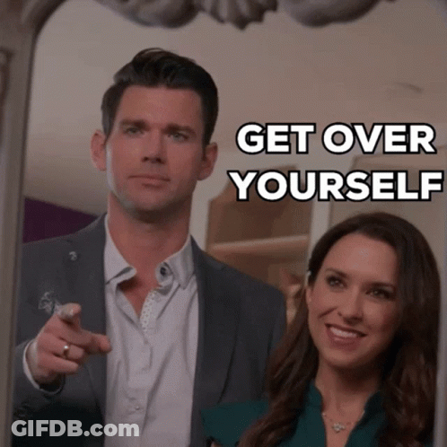 A Man Pointing At A Woman With The Words Get Over Yourself GIF