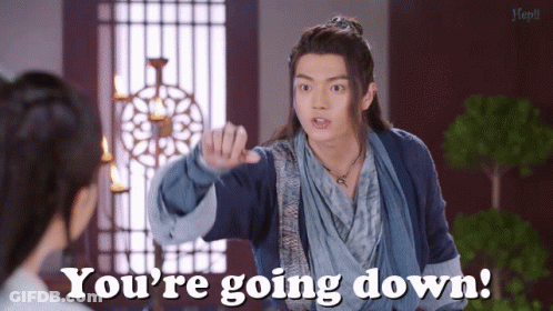A Man Pointing At A Woman With The Words You 'Re Going Down GIF