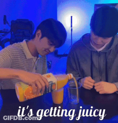 A Man Pouring Orange Juice Into A Glass With The Words It 'S Getting Juicy Below Him . GIF