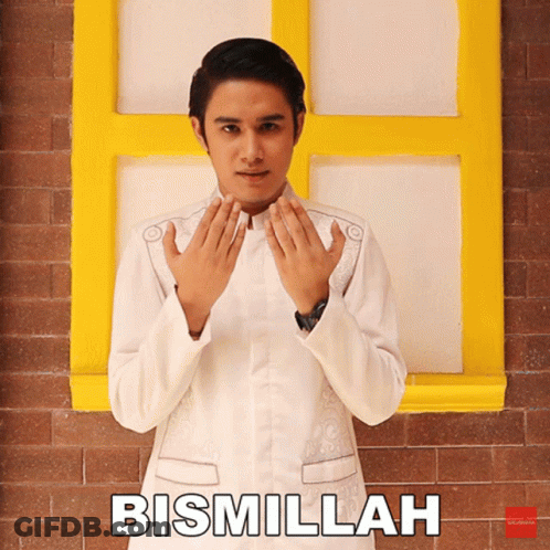 A Man Praying In Front Of A Yellow Window With The Word Bismillah On The Bottom Right GIF