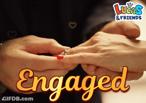 A Man Putting A Ring On A Woman 'S Finger With The Words Engaged Below GIF