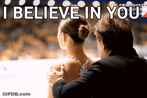 A Man Putting His Hand On A Woman 'S Shoulder With The Words " I Believe In You " Behind Him GIF