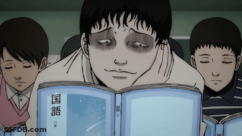 Man Reading Book With Chinese Characters GIF