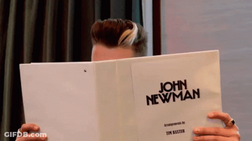 A Man Reads A Script For John Newman GIF