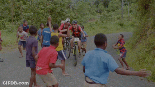 A Man Riding A Bike With A Number 1 On The Back GIF