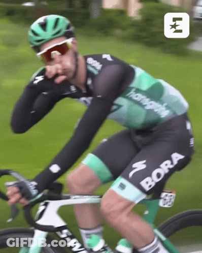A Man Riding A Bike With Bora Written On His Pants GIF