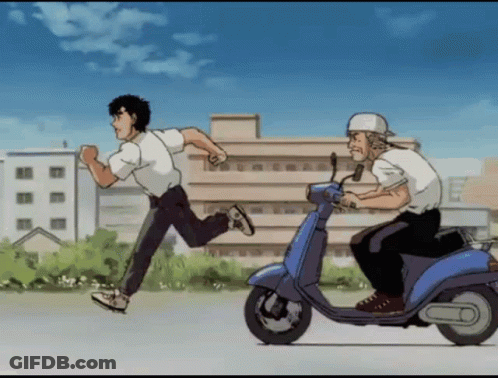 A Man Riding A Blue Scooter Is Running Behind Another Man GIF
