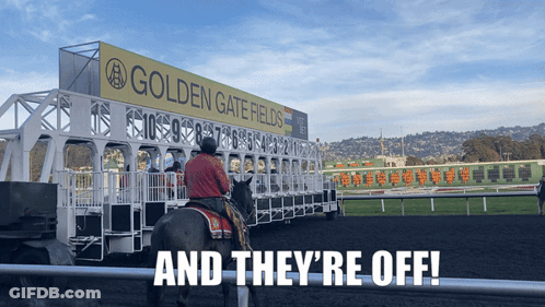 A Man Riding A Horse In Front Of A Sign For Golden Gate Fields GIF