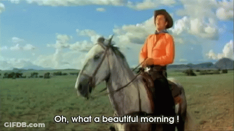 A Man Riding A Horse With The Words Oh What A Beautiful Morning GIF