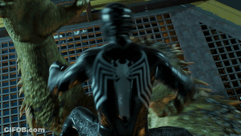 A Man Riding On The Back Of A Monster With Sharp Claws GIF