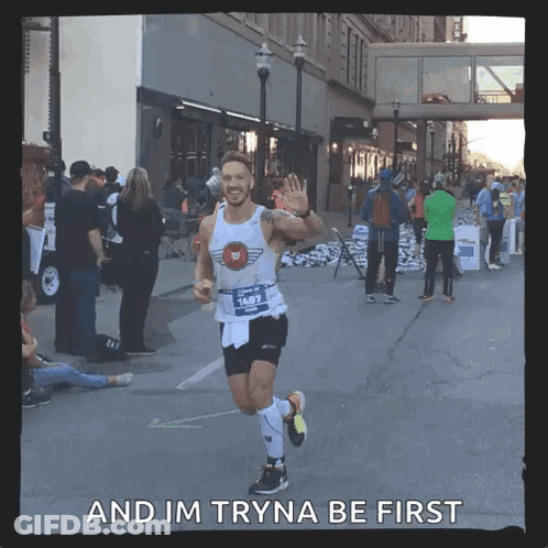 A Man Running A Marathon With The Words " And Im Tryna Be First " On The Bottom GIF