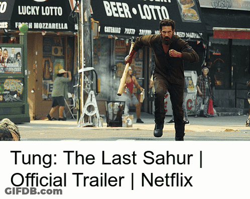 A Man Running Down A Street In Front Of A Beer Lotto GIF