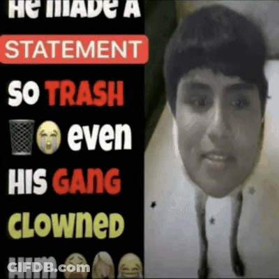 A Man 'S Face Is Behind A Sign That Says He Made A Statement So Trash Even His Gang Clowns Him GIF