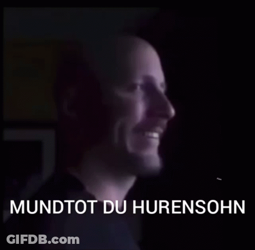 A Man 'S Face Is Shown With The Words Mundtot Du Hurensahn Written Below It GIF