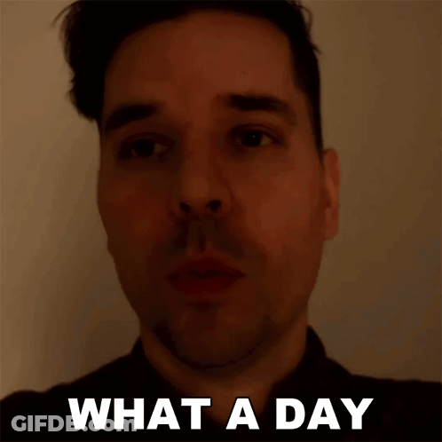 A Man 'S Face Is Shown With The Words What A Day Below It GIF
