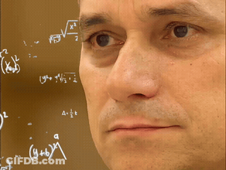 A Man 'S Face Is Visible In Front Of A Chalkboard With Math Equations GIF