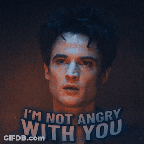 A Man 'S Face With The Words I 'M Not Angry With You Behind Him GIF