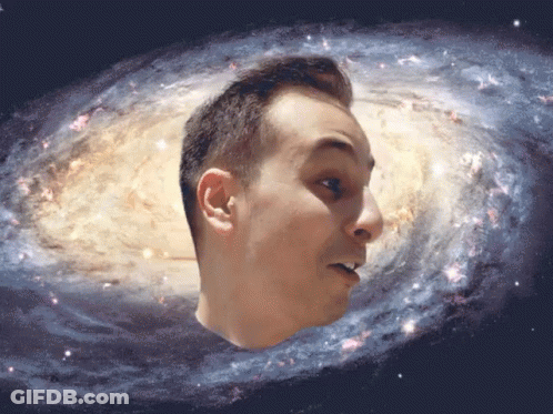 A Man 'S Head Is Surrounded By A Galaxy GIF