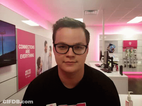 A Man 'S Head Is Upside Down In Front Of A Pink Wall That Says Everything Are Connections GIF