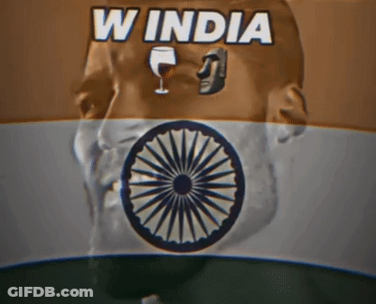 A Man 'S Head With A Wine Glass In His Mouth And The Words W India Above Him GIF