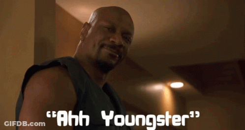 A Man Says " Ahh Youngster " In Front Of Another Man GIF