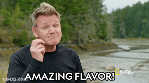 A Man Says Amazing Flavor In Front Of A Body Of Water GIF
