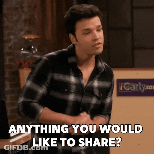 A Man Says Anything You Would Like To Share In Front Of A Sign That Says Icarly.com GIF