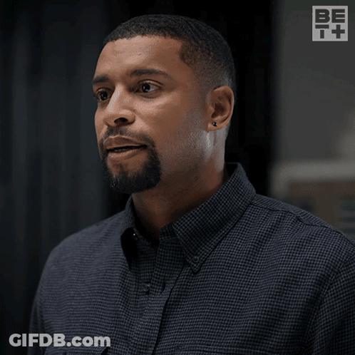 Man Saying Around Me Now Huh In Front Of Logo GIF