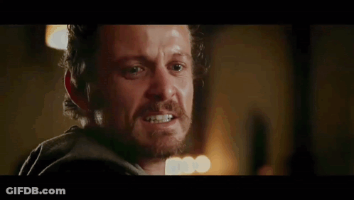 A Man Says " Cause That 'S Exactly What He Does " In A Dark Room GIF