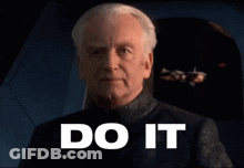 A Man Says Do It In White Letters On A Black Background GIF
