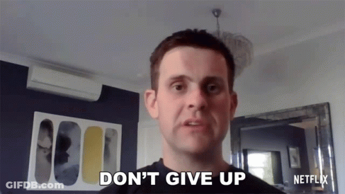A Man Says " Do N't Give Up " While Looking At The Camera GIF