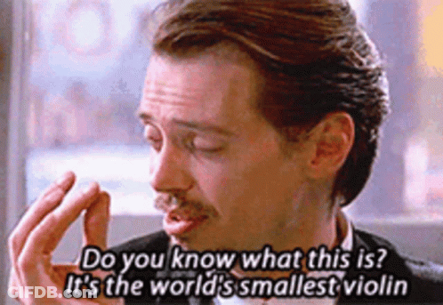 A Man Says Do You Know What This Is It 'S The World 'S Smallest Violin . GIF