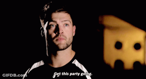 A Man Says Get This Party Going In The Dark GIF