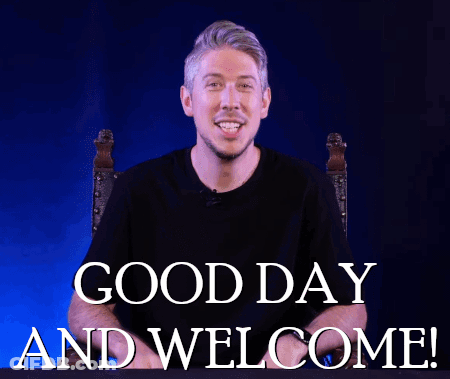A Man Says Good Day And Welcome With His Hands Up In The Air GIF