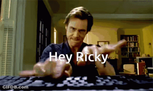 A Man Says Hey Ricky While Using A Keyboard GIF