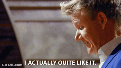 A Man Says I Actually Quite Like It In Front Of A Staircase GIF