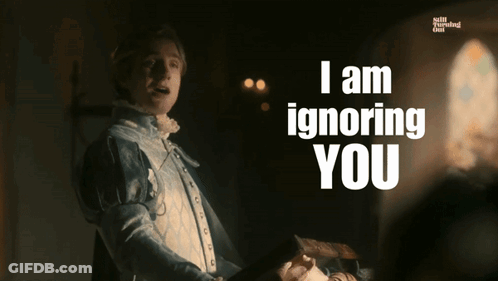 A Man Says I Am Ignoring You While Holding A Piece Of Paper GIF