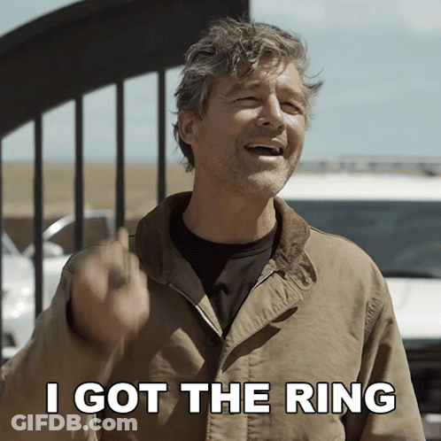 A Man Says I Got The Ring While Giving The Middle Finger GIF