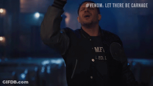 Man Holding Up Finger Saying I'll Be Right With You GIF