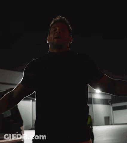 A Man Says I 'M Back Baby In A Dark Room GIF