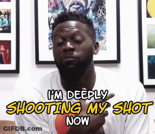 A Man Says I 'M Deeply Shooting My Shot Now In Front Of Framed Pictures GIF