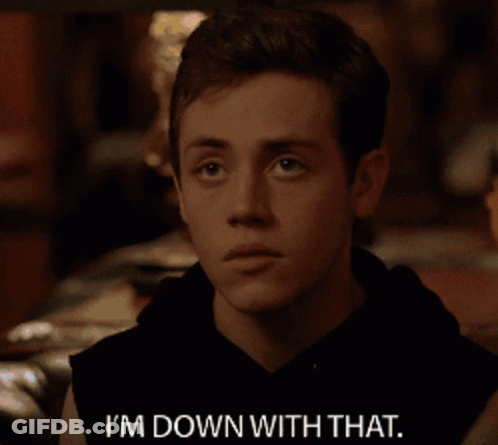 A Man Says I 'M Down With That In A Dark Room GIF